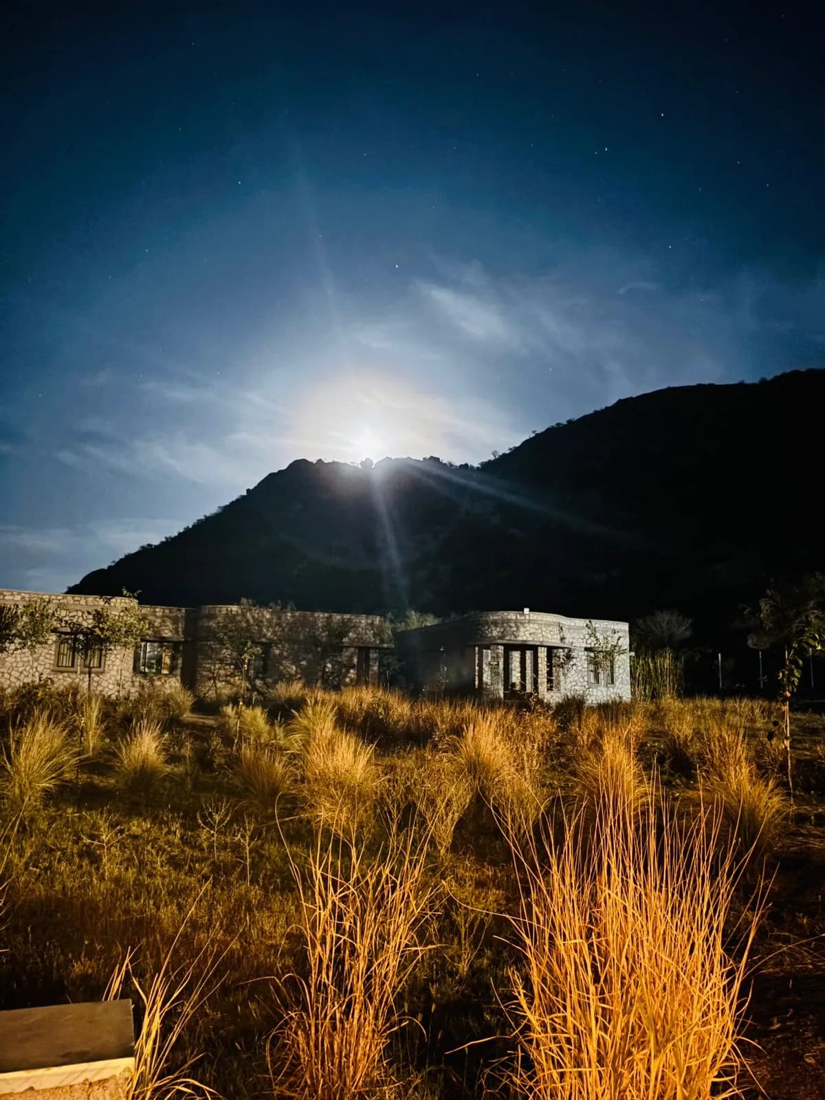Moonlit night view of granite kopje at J Wild Resort Jawai