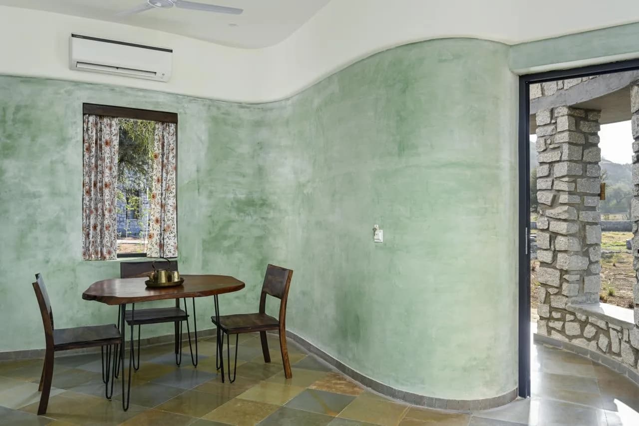 Indoor dining and seating area in J Wild villa